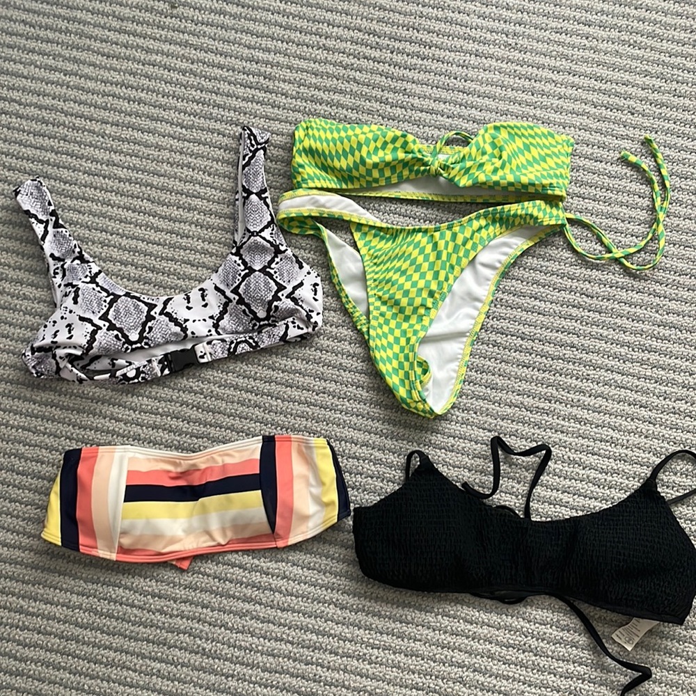 Three bikini tops and a set
